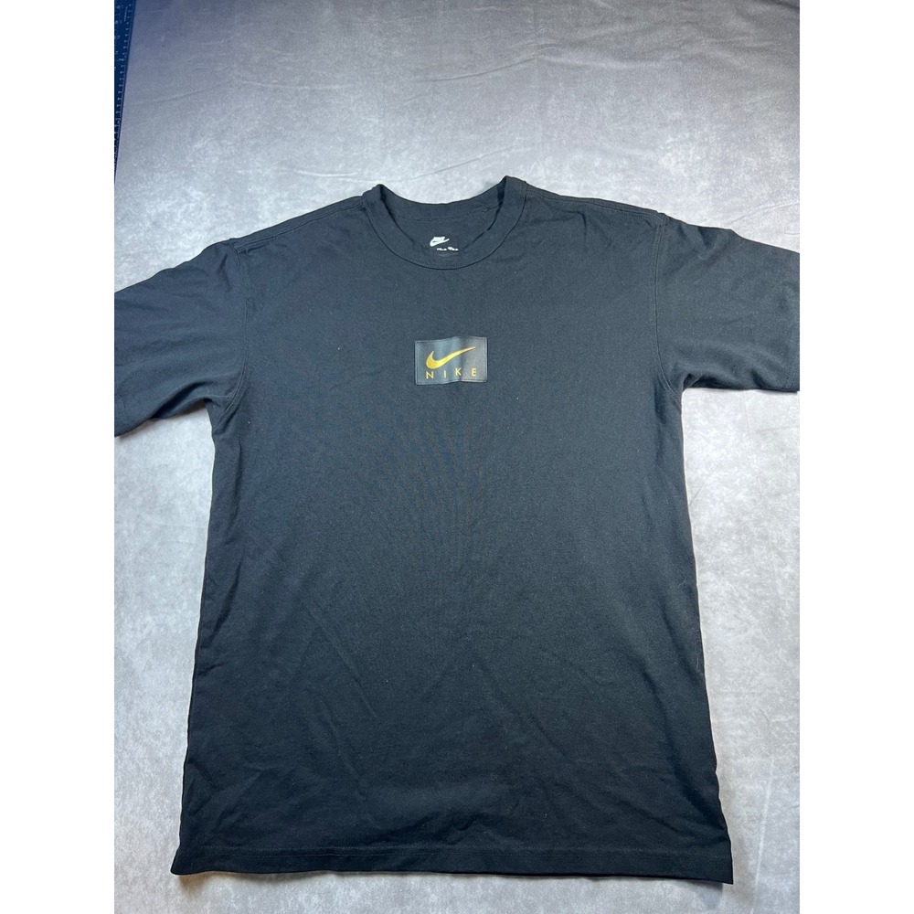 Nike T-Shirt Mens Small Black Loose Fit Golden Swoosh Patch Graphic Tee